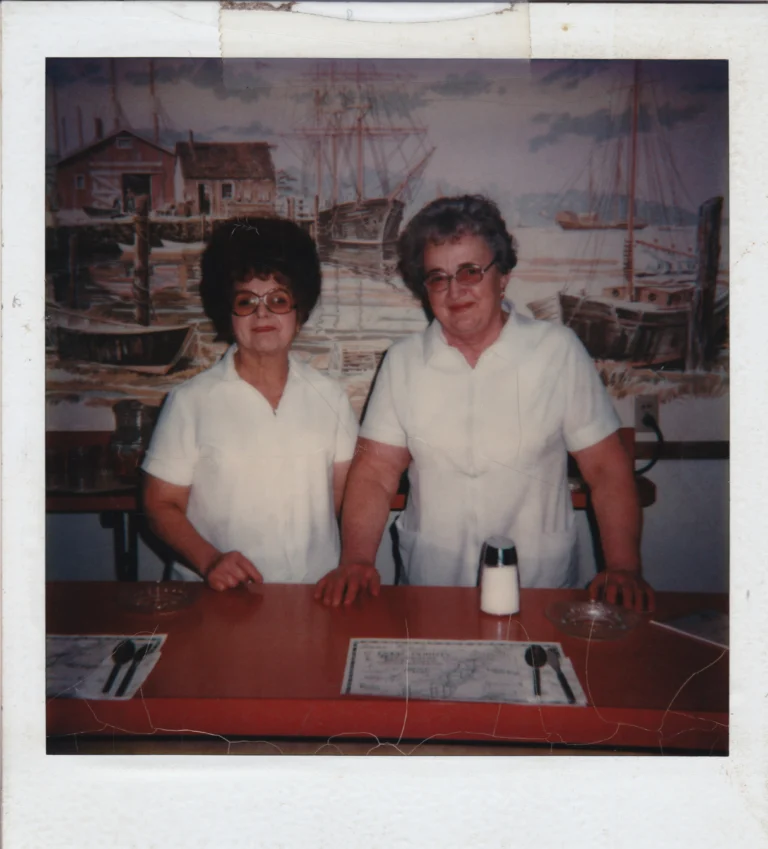 Polaroid photo of 2 women in the Holiday Diner