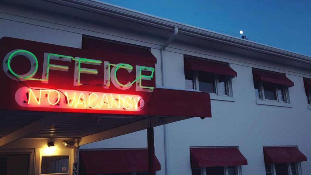 Holiday office lights and facade at dusk