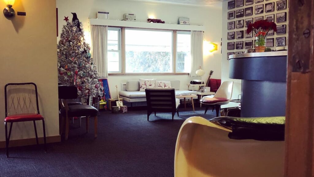 Holiday lobby featuring Christmas tree and other decor