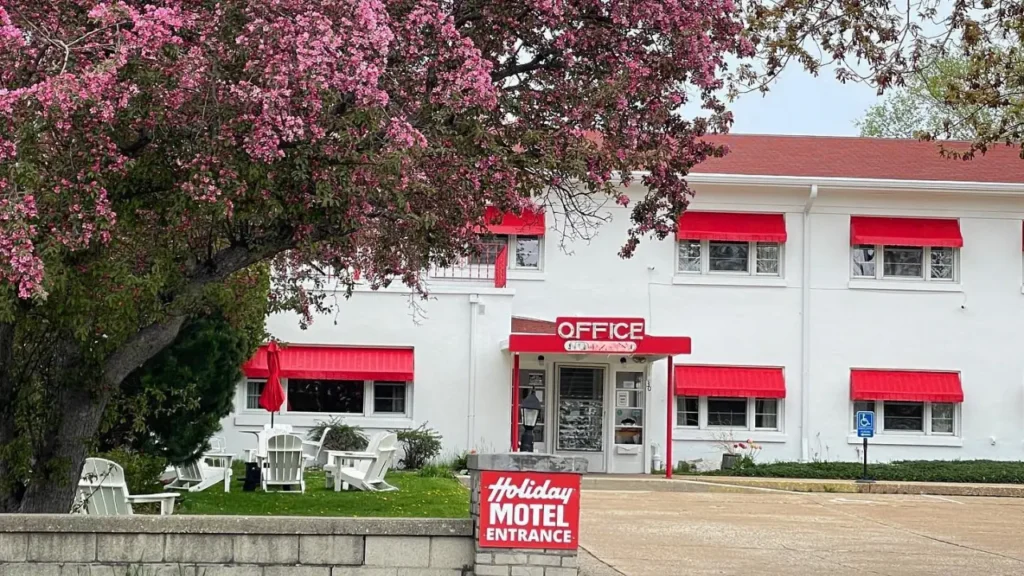 Holiday Music Motel entrance with blooming tree
